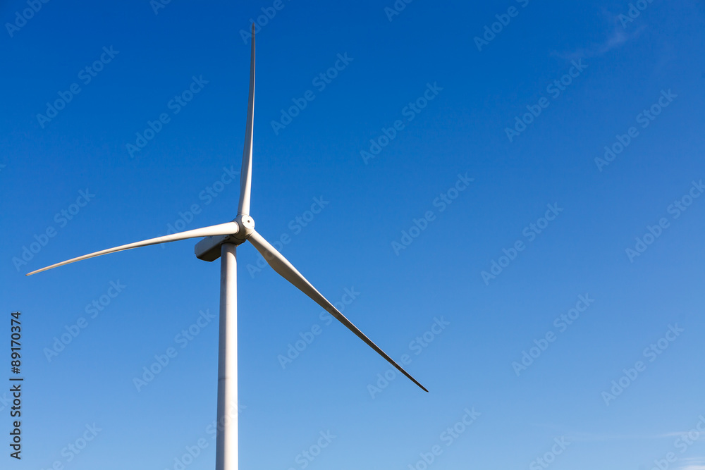Close up of wind turbine producing alternative energy Close up of wind turbine producing alternative energy