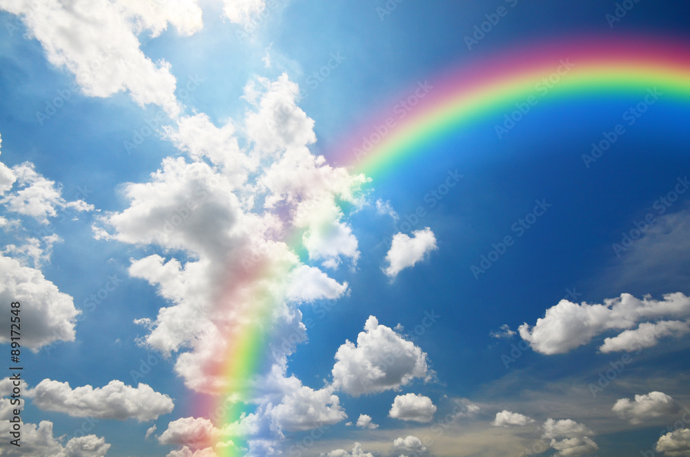 Rainbow and White clouds in blue sky background Stock Photo | Adobe Stock