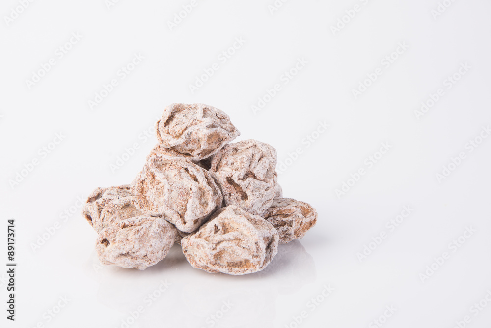 Salted Plum Tamarind Food Snack on a Background Salted Plum Tamarind Food Snack on a Background