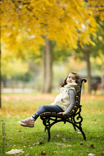 Little girl at the bench