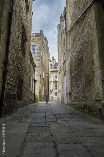 stone footpath alleyway with buildings