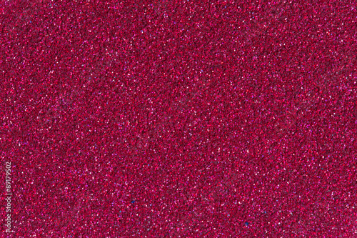 Crimson glitter background texture.