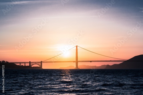 Sunset over Golden Gate bridge © stasenso