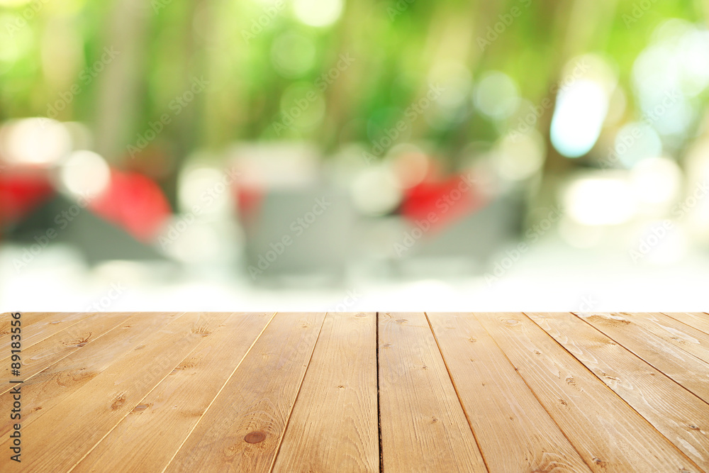 Wooden table  with abstract  blur background