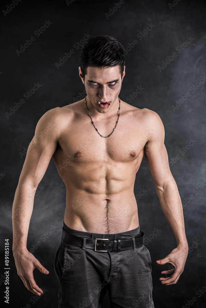 Young Vampire Man Shirtless, Gesturing to Camera