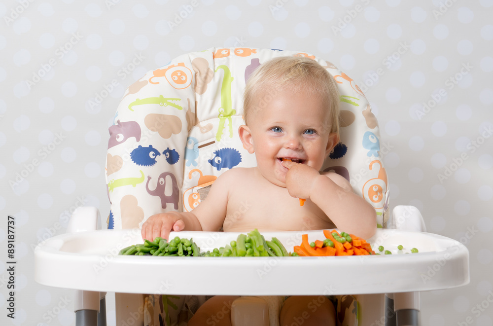 Baby girl eating raw food Baby girl eating raw food