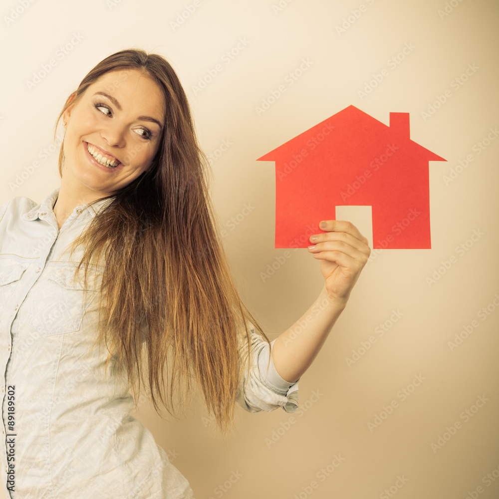 Woman and paper house. Housing real estate concept