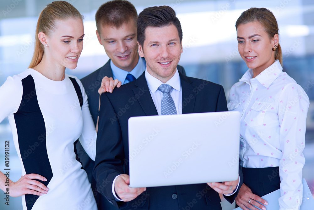 Group of business people doing presentation with laptop during Group of business people doing presentation with laptop during