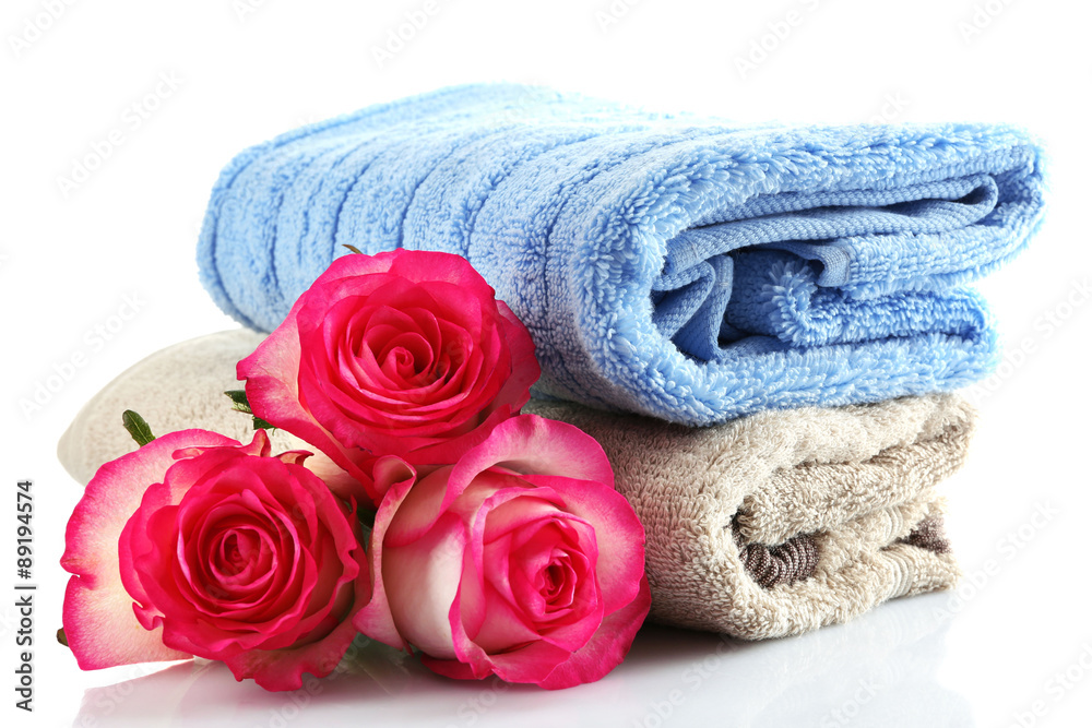 Stack of colorful towels isolated on white Stack of colorful towels isolated on white