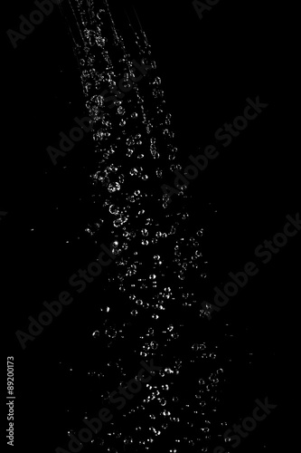 Drops of water on a black background. Texture. © Vagengeim