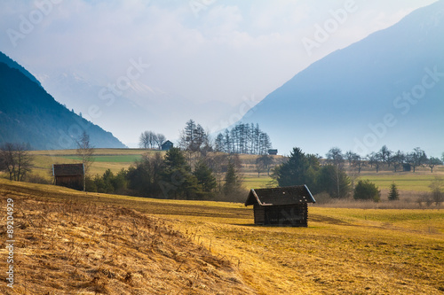 Rural mountain landscape with a hut