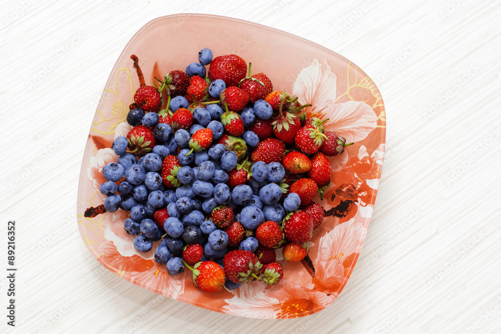 Blueberry and strawberry fruits on a plate Blueberry and strawberry fruits on a plate