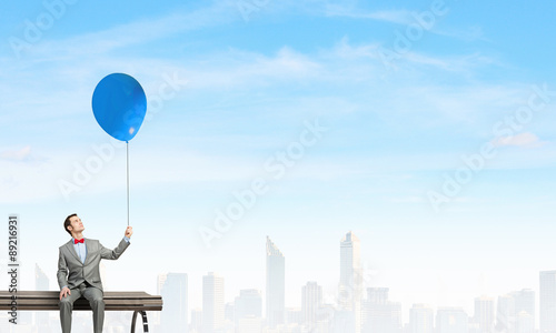 Businessman with balloon © Sergey Nivens