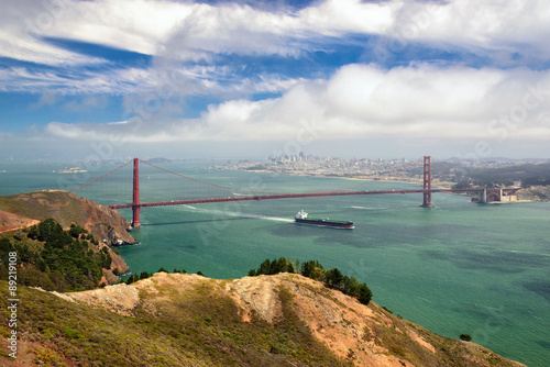 Aerial view of San Francisco City and Golden Gate Bridge under beautiful sky, San Francisco, California