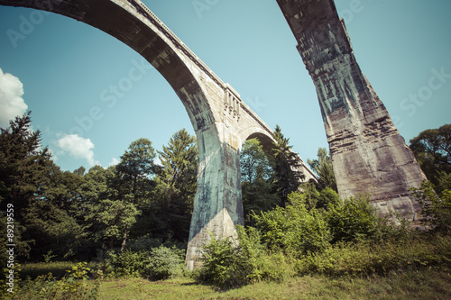 Fototapeta Naklejka Na Ścianę i Meble -  Old concrete railway bridge in Stanczyki, Mazury, Poland