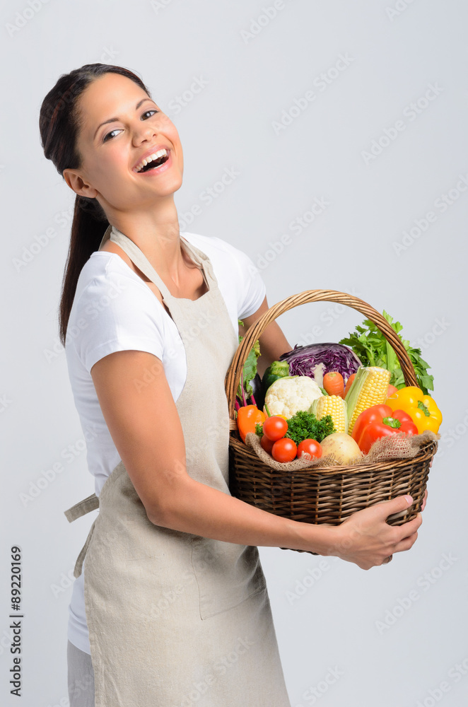 Basket of raw peppers, tomatoes, cauliflower, celery, corn Basket of raw peppers, tomatoes, cauliflower, celery, corn