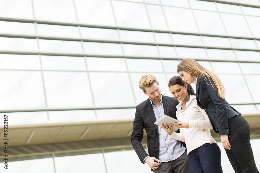 Young business people outdoors Young business people outdoors