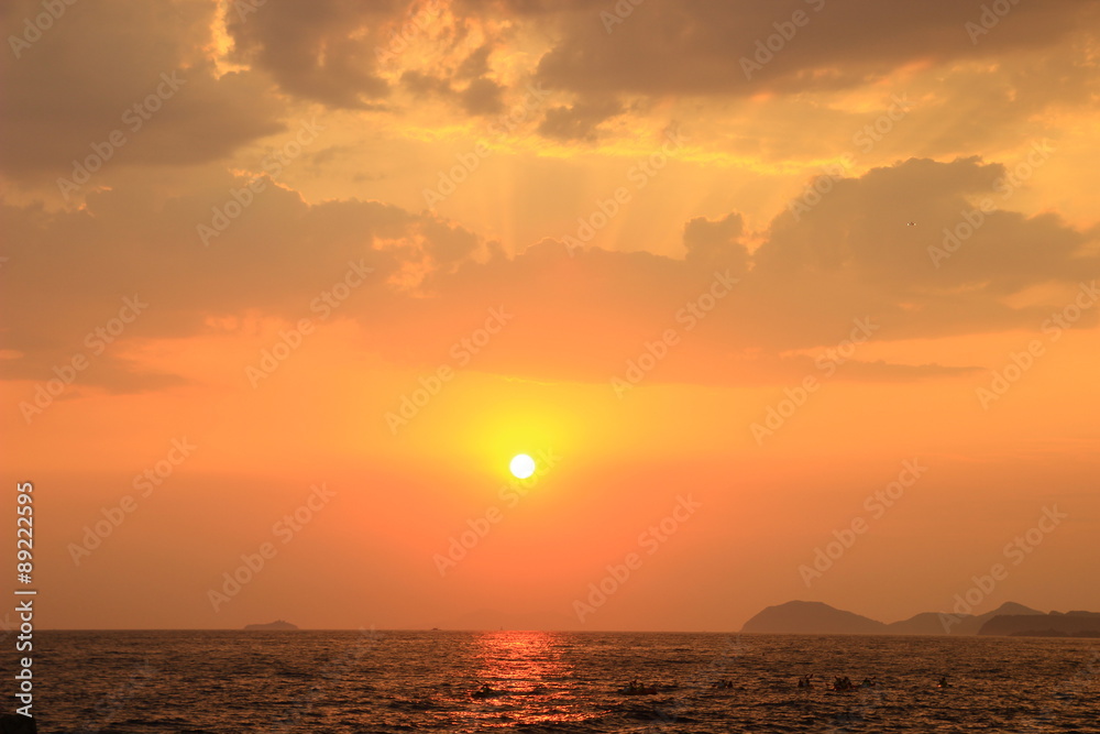 Sea kayaking on the sunset