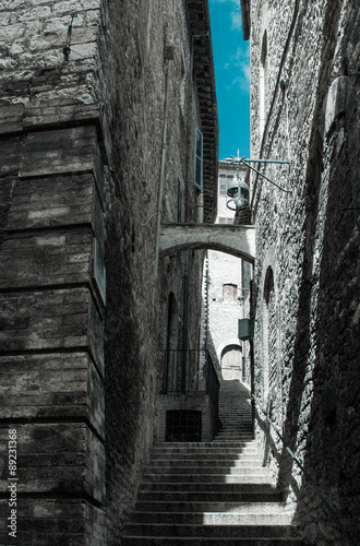 Alley in old stone town in Italy