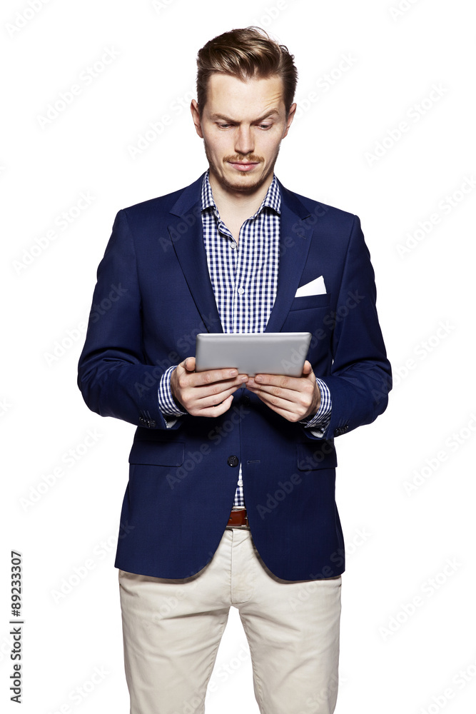 Handsome man using digital tablet Handsome man using digital tablet