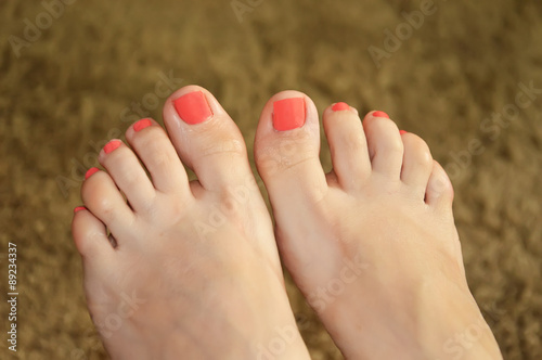 Female feet with painted nails