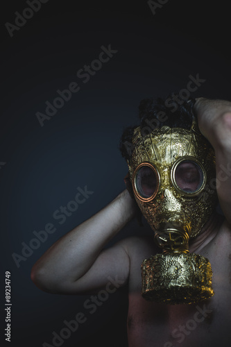atomic, depression and danger man with golden gas mask