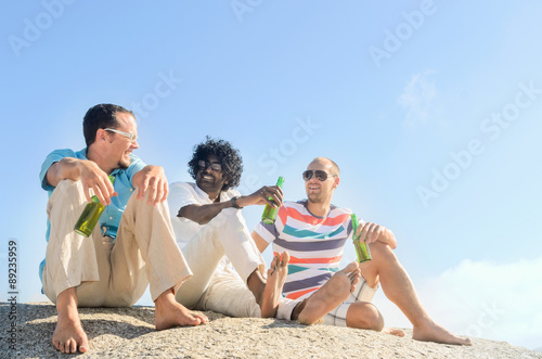 Friends relaxing with some beers on a clear sunny day