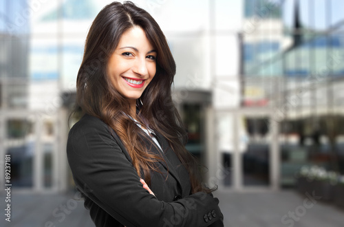 Smiling businesswoman outdoor Free Download Smiling businesswoman outdoor - GFXLoad