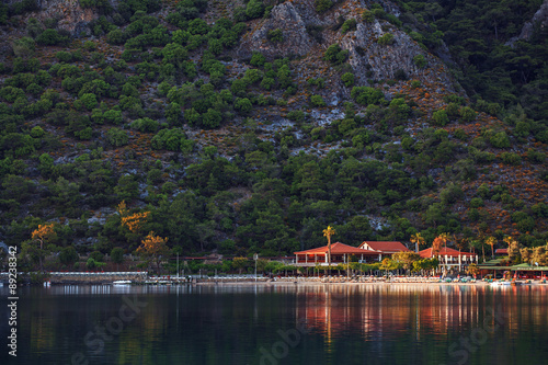 Beautiful Sunset on the sea, in the background mountains