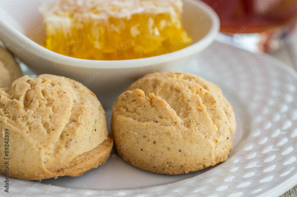 Traditional round shortbread biscuits with honey