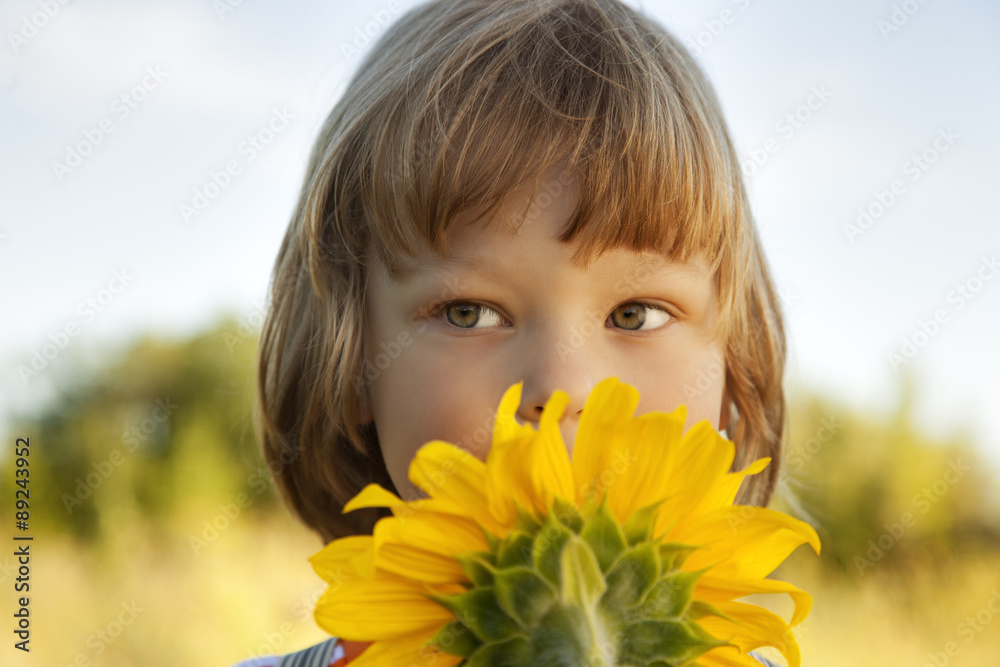 Happy boy with sunflower Happy boy with sunflower