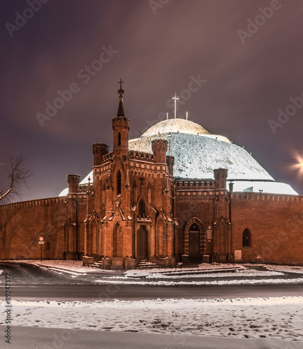 Kosciuszko mound surrounded by old fortifications in Krakow, Poland, during winter night #89247372