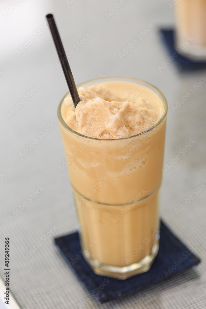 Iced coffee smoothie on table Iced coffee smoothie on table