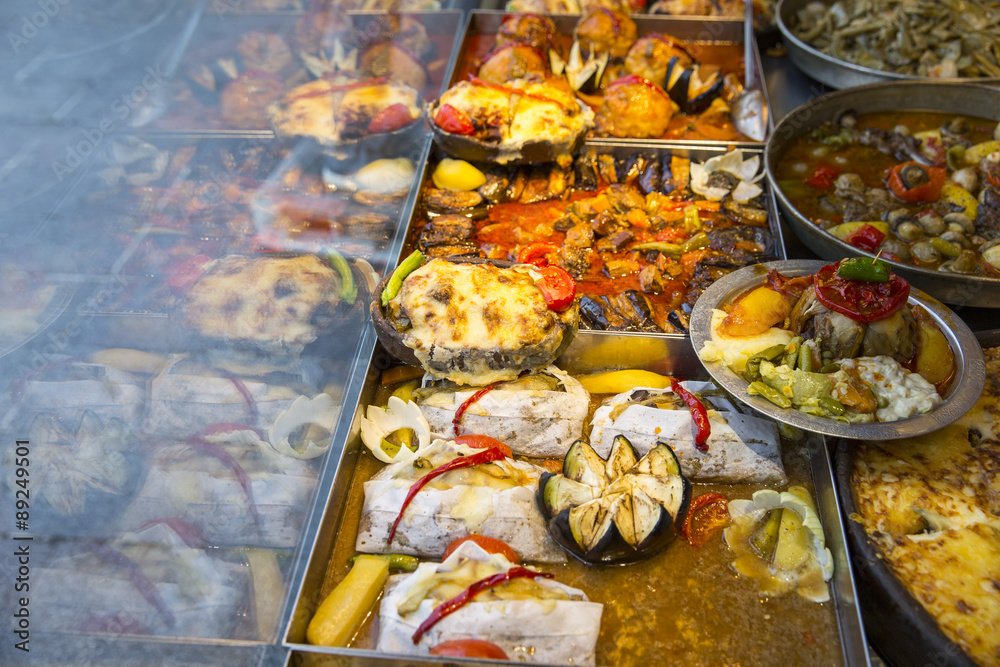 Traditional colorful Turkish food near showcase in a restaurant Traditional colorful Turkish food near showcase in a restaurant
