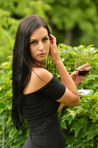 Woman drinking red wine 