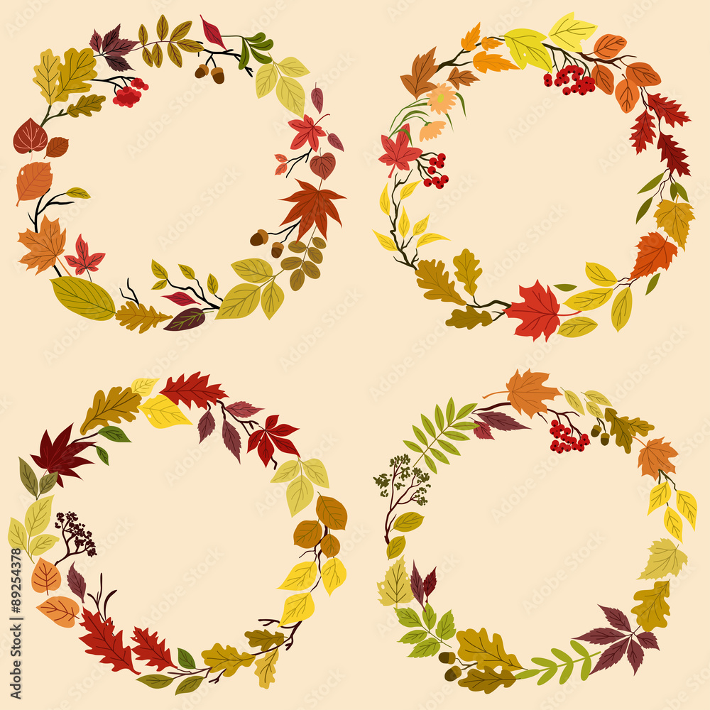 Wreaths of autumn leaves, flowers and herbs