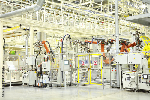 Part of the welding in a large automobile factory