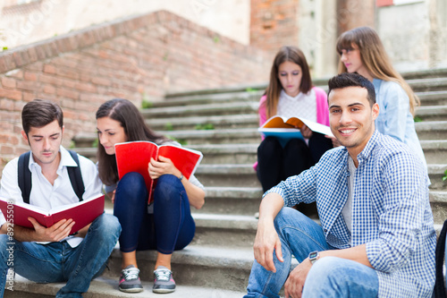 Group of students sitting on a staircase photo