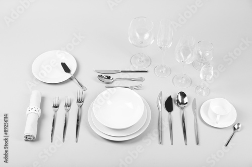 Table setting, close up, on grey background