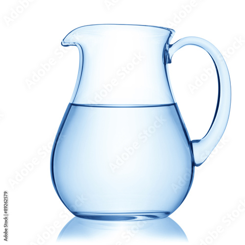 Glass pitcher of water.