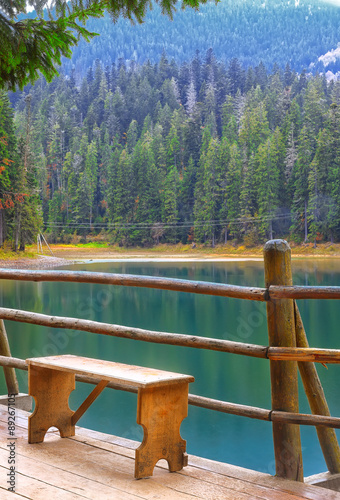 bench on the dock mountain lake photo