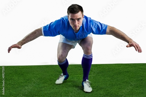 Rugby player ready to tackle the opponent