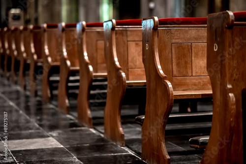 Wooden pews in a row in a church