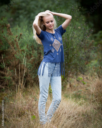 Fototapeta Naklejka Na Ścianę i Meble -  Beautiful Angel White Teenage Girl In A Field