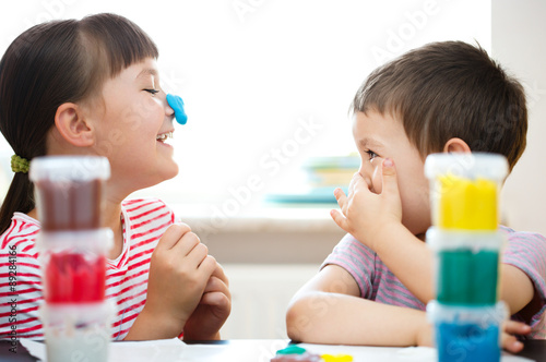 Children playing with color play dough
