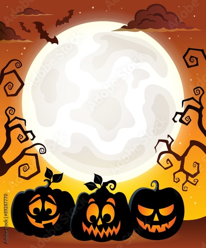 Moon with Halloween pumpkin silhouettes