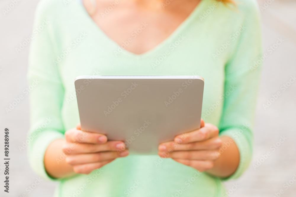 close up of woman with tablet pc outdoors close up of woman with tablet pc outdoors