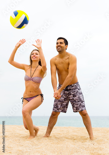 couple playing volleyball