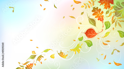 Falling autumn leaves on bright background.