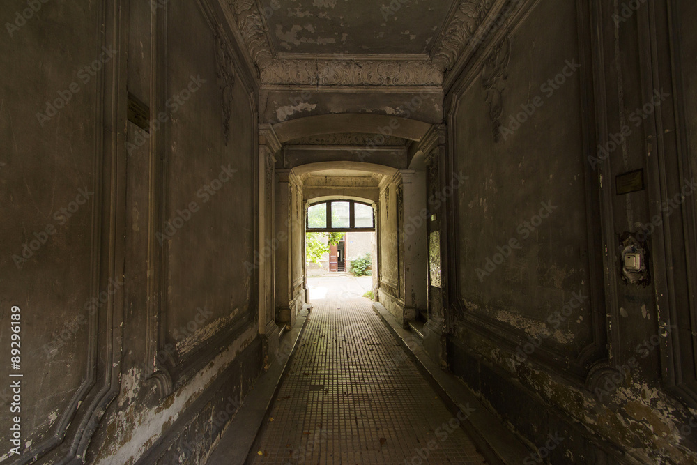 Decayed corridor in an abandoned residential building